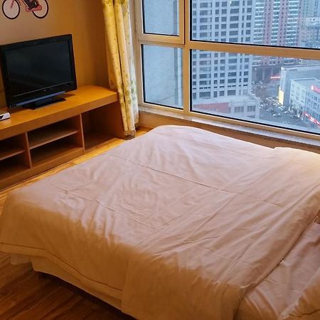 Dalian Yidian Yijing Huayuan Apartment Стая снимка