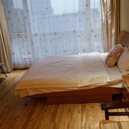 Dalian Yidian Yijing Huayuan Apartment Стая снимка