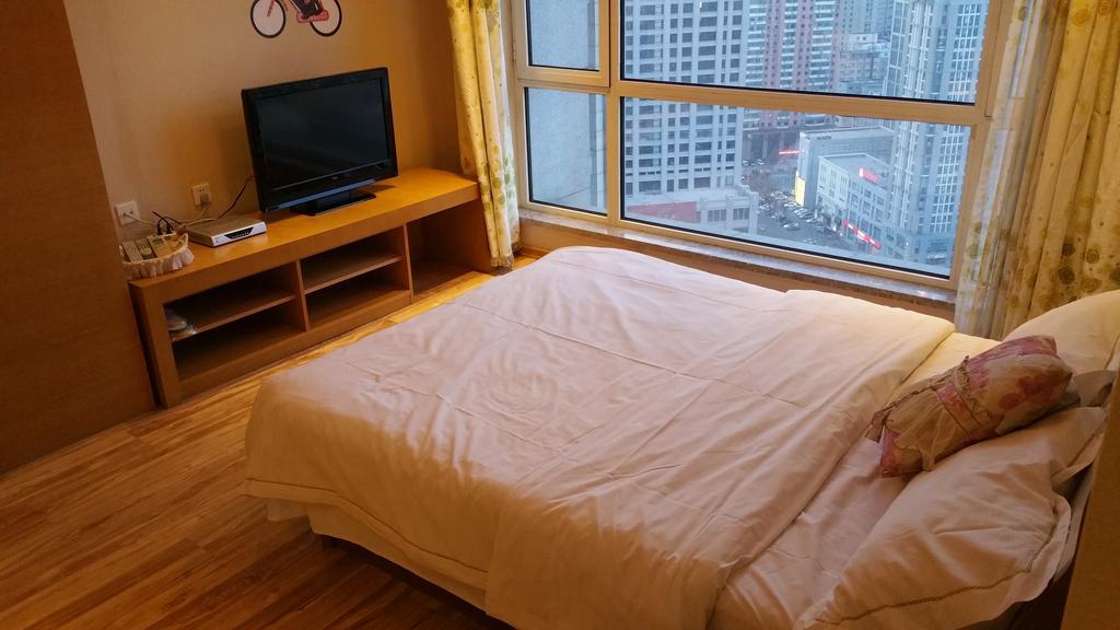 Dalian Yidian Yijing Huayuan Apartment Стая снимка