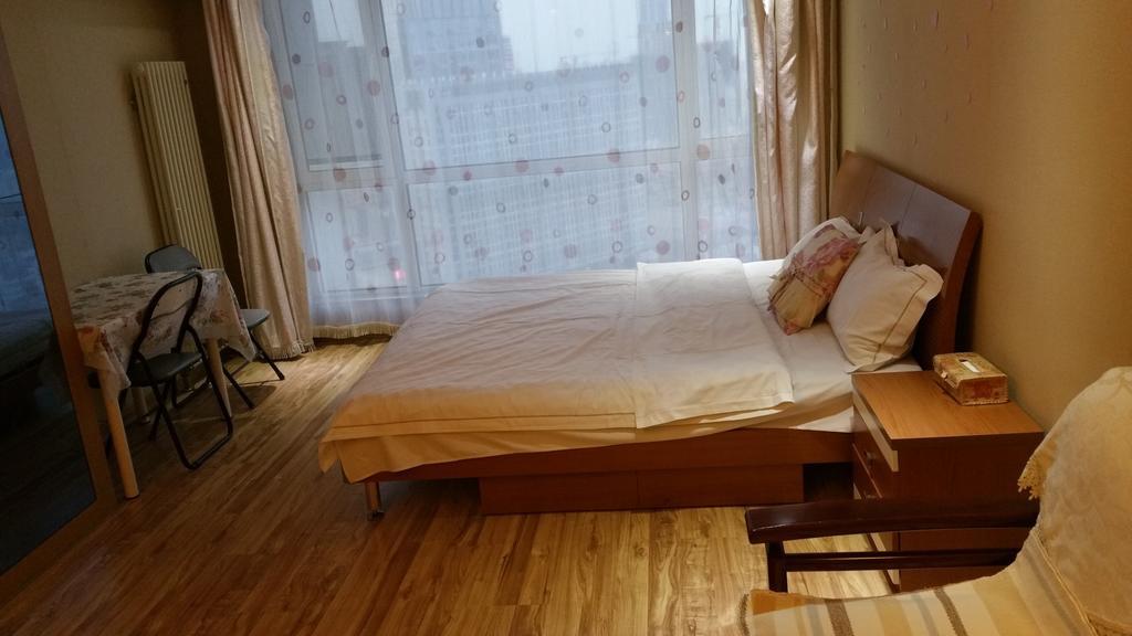 Dalian Yidian Yijing Huayuan Apartment Стая снимка